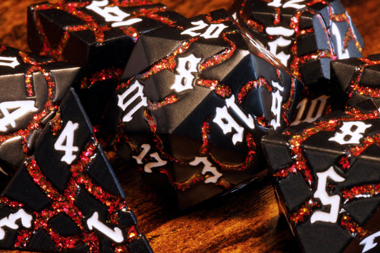 Inferno Matrix Metal Dice set - Fiery Cracks & Black Finish - The Wizard's Vault