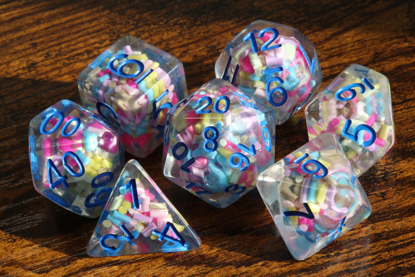 Funfetti cake dice set -  Sprinkle core DND Dice, Colorful sprinkles in a clear resin & blue font, Perfect Dungeon Master Birthday Gift - The Wizard's Vault